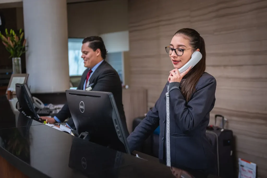 Foreigners working at the front desk of a hotel